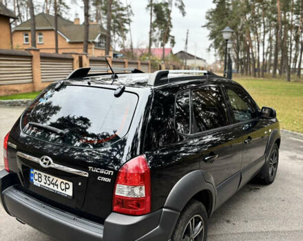 Черный Хендай Туксон, объемом двигателя 1.99 л и пробегом 266 тыс. км за 7500 $, фото 21 на Automoto.ua