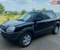 Черный Хендай Туксон, объемом двигателя 2.7 л и пробегом 180 тыс. км за 7900 $, фото 1 на Automoto.ua