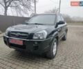 Черный Хендай Туксон, объемом двигателя 1.98 л и пробегом 176 тыс. км за 8200 $, фото 1 на Automoto.ua