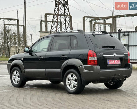 Чорний Хендай Туксон, об'ємом двигуна 2 л та пробігом 230 тис. км за 6850 $, фото 5 на Automoto.ua