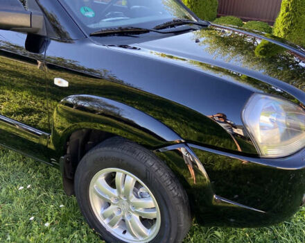 Черный Хендай Туксон, объемом двигателя 1.98 л и пробегом 197 тыс. км за 8000 $, фото 9 на Automoto.ua