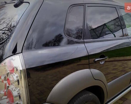 Чорний Хендай Туксон, об'ємом двигуна 2 л та пробігом 229 тис. км за 8600 $, фото 69 на Automoto.ua