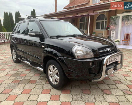 Черный Хендай Туксон, объемом двигателя 2 л и пробегом 219 тыс. км за 8600 $, фото 7 на Automoto.ua