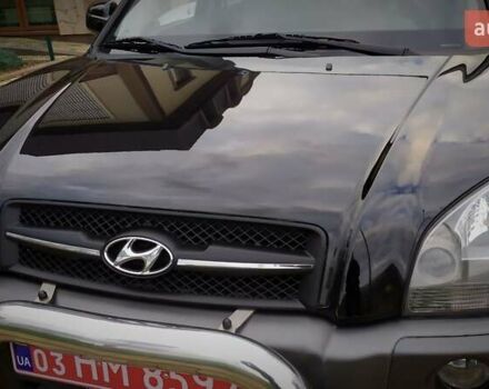 Чорний Хендай Туксон, об'ємом двигуна 2 л та пробігом 229 тис. км за 8600 $, фото 59 на Automoto.ua