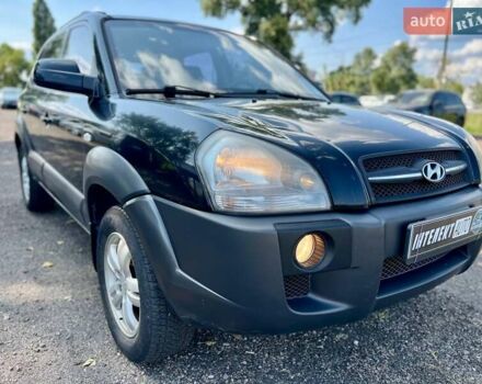 Черный Хендай Туксон, объемом двигателя 2 л и пробегом 227 тыс. км за 8200 $, фото 32 на Automoto.ua