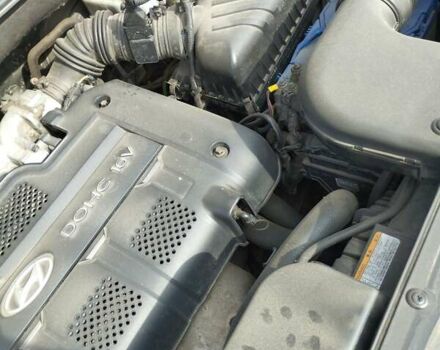 Черный Хендай Туксон, объемом двигателя 2 л и пробегом 270 тыс. км за 7500 $, фото 8 на Automoto.ua