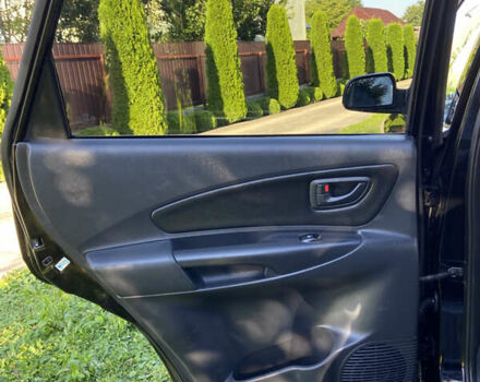 Черный Хендай Туксон, объемом двигателя 1.98 л и пробегом 197 тыс. км за 8000 $, фото 33 на Automoto.ua