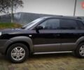 Чорний Хендай Туксон, об'ємом двигуна 2 л та пробігом 229 тис. км за 8600 $, фото 28 на Automoto.ua