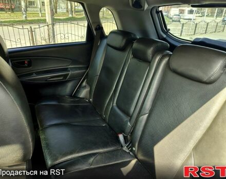 Чорний Хендай Туксон, об'ємом двигуна 2 л та пробігом 350 тис. км за 7500 $, фото 3 на Automoto.ua