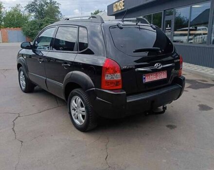 Черный Хендай Туксон, объемом двигателя 2 л и пробегом 255 тыс. км за 8400 $, фото 17 на Automoto.ua