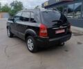 Черный Хендай Туксон, объемом двигателя 2 л и пробегом 255 тыс. км за 8400 $, фото 17 на Automoto.ua