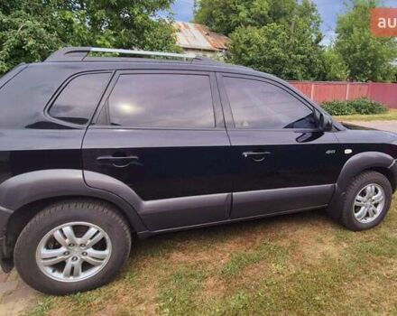 Чорний Хендай Туксон, об'ємом двигуна 1.98 л та пробігом 96 тис. км за 9600 $, фото 12 на Automoto.ua