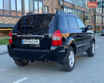 Черный Хендай Туксон, объемом двигателя 1.98 л и пробегом 286 тыс. км за 7300 $, фото 5 на Automoto.ua