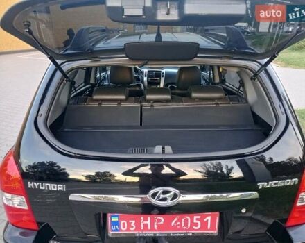 Чорний Хендай Туксон, об'ємом двигуна 1.98 л та пробігом 192 тис. км за 7950 $, фото 42 на Automoto.ua