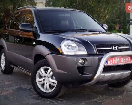 Черный Хендай Туксон, объемом двигателя 2 л и пробегом 230 тыс. км за 8600 $, фото 95 на Automoto.ua