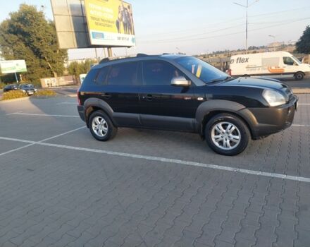 Черный Хендай Туксон, объемом двигателя 2 л и пробегом 289 тыс. км за 6600 $, фото 5 на Automoto.ua