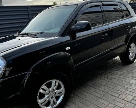 Чорний Хендай Туксон, об'ємом двигуна 2 л та пробігом 240 тис. км за 8600 $, фото 2 на Automoto.ua