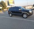 Черный Хендай Туксон, объемом двигателя 2 л и пробегом 289 тыс. км за 6600 $, фото 5 на Automoto.ua