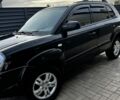 Чорний Хендай Туксон, об'ємом двигуна 2 л та пробігом 240 тис. км за 8600 $, фото 2 на Automoto.ua