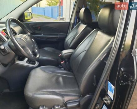 Черный Хендай Туксон, объемом двигателя 2 л и пробегом 219 тыс. км за 7990 $, фото 46 на Automoto.ua