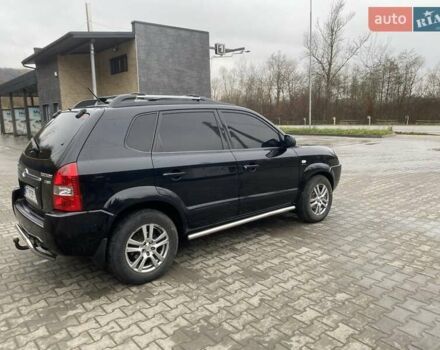 Чорний Хендай Туксон, об'ємом двигуна 1.99 л та пробігом 345 тис. км за 7600 $, фото 12 на Automoto.ua