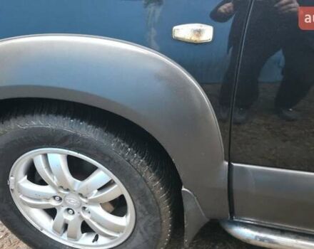 Чорний Хендай Туксон, об'ємом двигуна 2 л та пробігом 207 тис. км за 8200 $, фото 10 на Automoto.ua