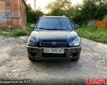 Черный Хендай Туксон, объемом двигателя 2.7 л и пробегом 145 тыс. км за 6950 $, фото 2 на Automoto.ua