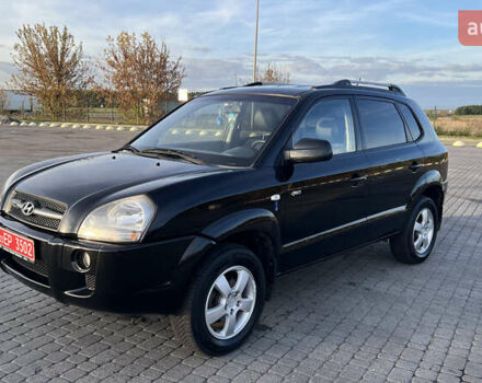 Черный Хендай Туксон, объемом двигателя 1.98 л и пробегом 243 тыс. км за 8500 $, фото 9 на Automoto.ua