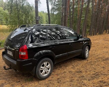 Черный Хендай Туксон, объемом двигателя 2 л и пробегом 240 тыс. км за 8800 $, фото 3 на Automoto.ua