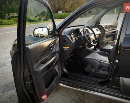Черный Хендай Туксон, объемом двигателя 2 л и пробегом 230 тыс. км за 8600 $, фото 135 на Automoto.ua