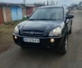 Чорний Хендай Туксон, об'ємом двигуна 2 л та пробігом 246 тис. км за 8100 $, фото 1 на Automoto.ua