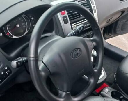 Черный Хендай Туксон, объемом двигателя 1.98 л и пробегом 155 тыс. км за 7999 $, фото 30 на Automoto.ua