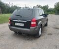Черный Хендай Туксон, объемом двигателя 2 л и пробегом 160 тыс. км за 7600 $, фото 4 на Automoto.ua