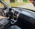 Черный Хендай Туксон, объемом двигателя 2 л и пробегом 219 тыс. км за 7990 $, фото 55 на Automoto.ua