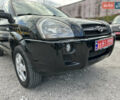 Чорний Хендай Туксон, об'ємом двигуна 2 л та пробігом 180 тис. км за 7999 $, фото 6 на Automoto.ua