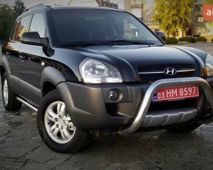 Черный Хендай Туксон, объемом двигателя 2 л и пробегом 230 тыс. км за 8600 $, фото 26 на Automoto.ua