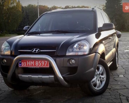 Черный Хендай Туксон, объемом двигателя 2 л и пробегом 230 тыс. км за 8600 $, фото 2 на Automoto.ua