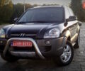 Черный Хендай Туксон, объемом двигателя 2 л и пробегом 230 тыс. км за 8600 $, фото 2 на Automoto.ua