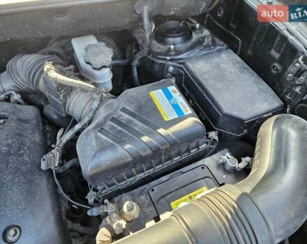 Чорний Хендай Туксон, об'ємом двигуна 2 л та пробігом 152 тис. км за 7950 $, фото 6 на Automoto.ua