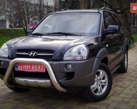 Чорний Хендай Туксон, об'ємом двигуна 2 л та пробігом 229 тис. км за 8600 $, фото 3 на Automoto.ua