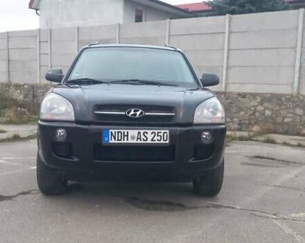 Черный Хендай Туксон, объемом двигателя 1.98 л и пробегом 155 тыс. км за 7999 $, фото 1 на Automoto.ua