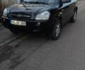 Черный Хендай Туксон, объемом двигателя 2 л и пробегом 84 тыс. км за 8650 $, фото 1 на Automoto.ua