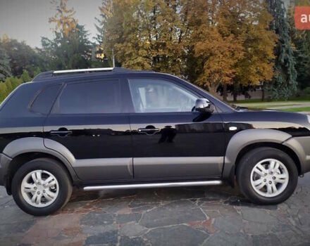 Черный Хендай Туксон, объемом двигателя 2 л и пробегом 230 тыс. км за 8600 $, фото 112 на Automoto.ua