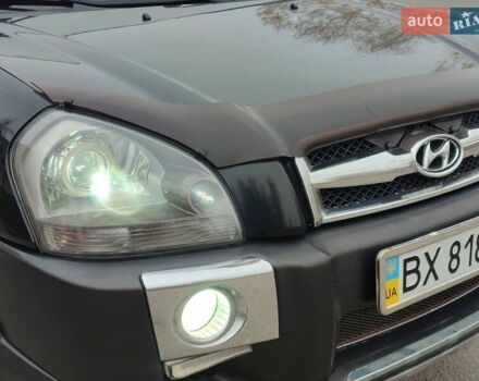 Черный Хендай Туксон, объемом двигателя 2 л и пробегом 270 тыс. км за 6800 $, фото 13 на Automoto.ua