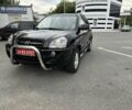 Черный Хендай Туксон, объемом двигателя 2 л и пробегом 199 тыс. км за 7820 $, фото 2 на Automoto.ua