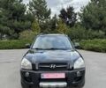 Черный Хендай Туксон, объемом двигателя 2 л и пробегом 215 тыс. км за 7999 $, фото 3 на Automoto.ua