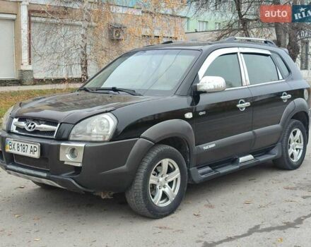 Черный Хендай Туксон, объемом двигателя 2 л и пробегом 270 тыс. км за 6800 $, фото 3 на Automoto.ua