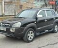 Черный Хендай Туксон, объемом двигателя 2 л и пробегом 270 тыс. км за 6800 $, фото 3 на Automoto.ua