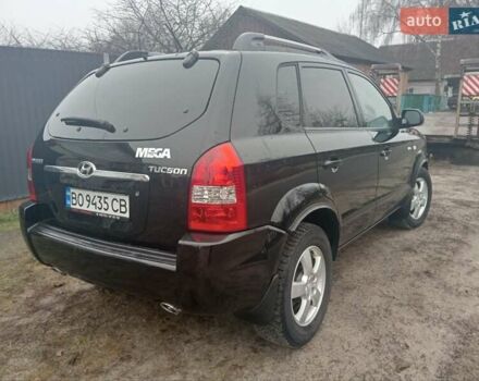Черный Хендай Туксон, объемом двигателя 1.99 л и пробегом 235 тыс. км за 9000 $, фото 7 на Automoto.ua