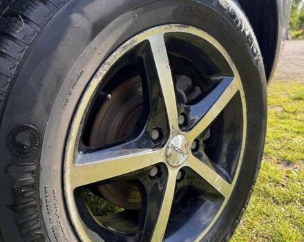 Чорний Хендай Туксон, об'ємом двигуна 2 л та пробігом 186 тис. км за 8099 $, фото 5 на Automoto.ua